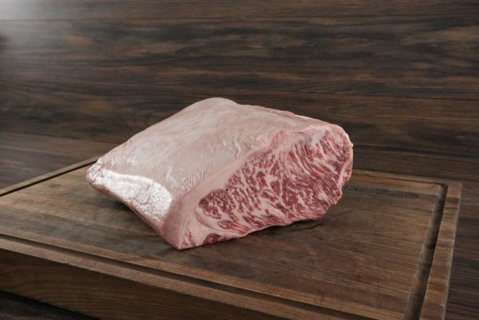 Jade Pure Wagyu Striploin Halves BMS 8-9 – premium marbled beef cuts on butcher board